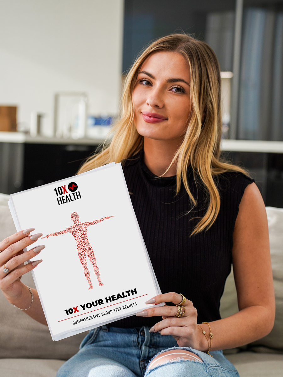 a client holding their 10X Health blood test package