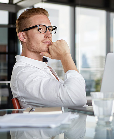 business man thinking at desk