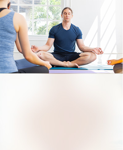 a person sitting in a meditative pose, supported by 10X Health Supplements
