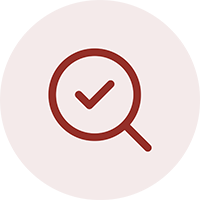 icon of a checkmark in the lens of a magnifying glass
