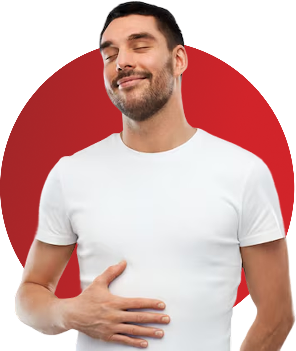 man smiling while holding his hand over his stomach man smiling while holding his hand over his stomach